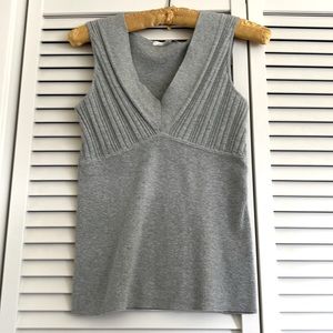 Lightly used gray sleeveless sweater top.